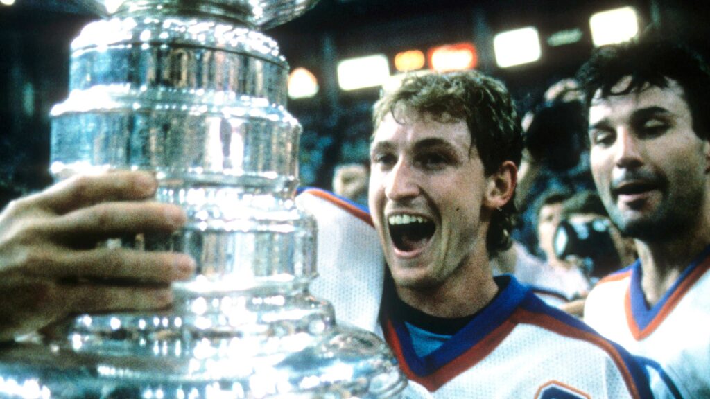 Wayne Gretzky lifting the Stanley Cup on May 31 1987 1