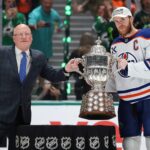 Connor McDavid holding the Campbell Bowl