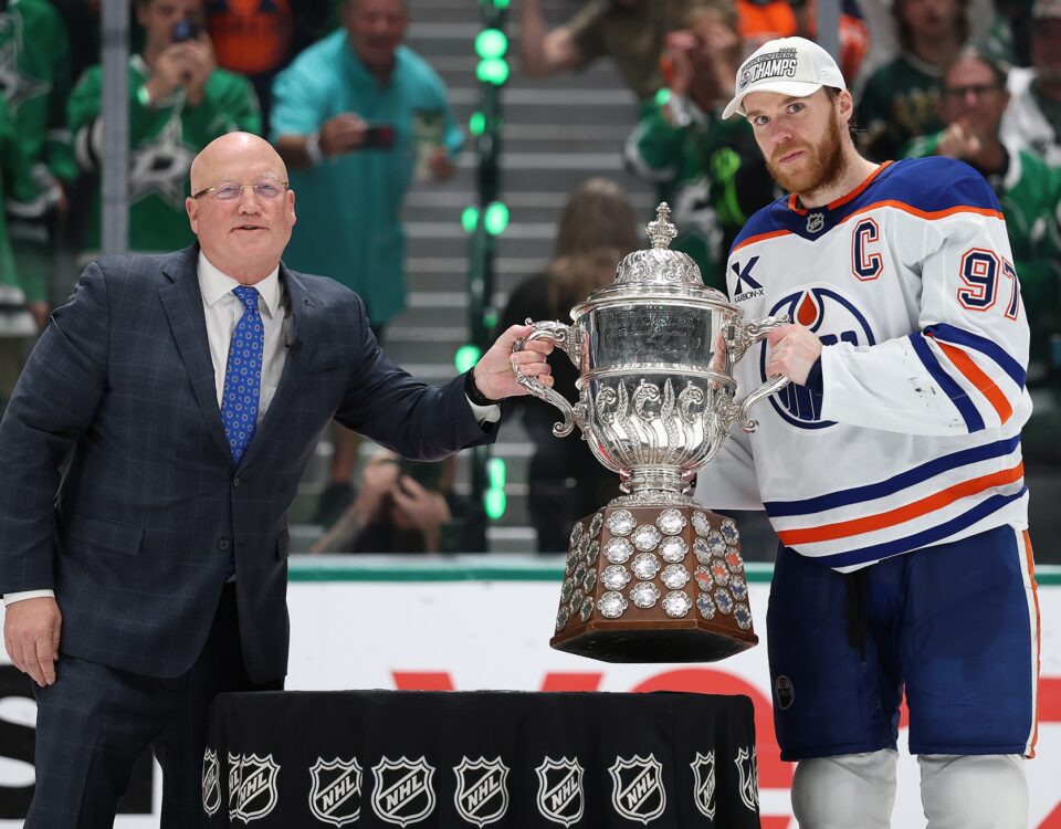 Connor McDavid holding the Campbell Bowl